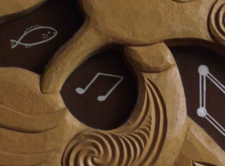 Maori woodwork with symbols