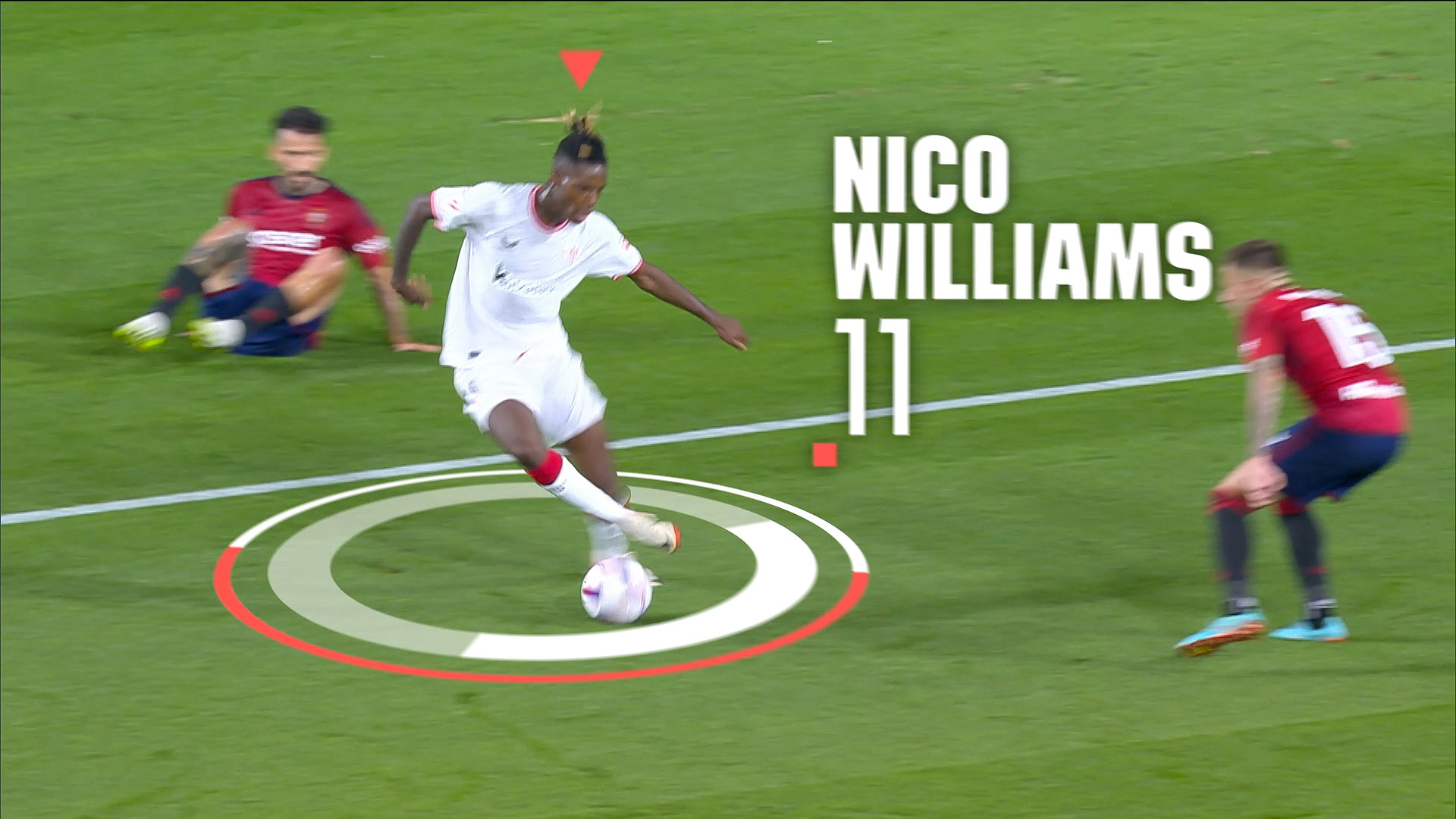 Nico williams in action on a soccer field.