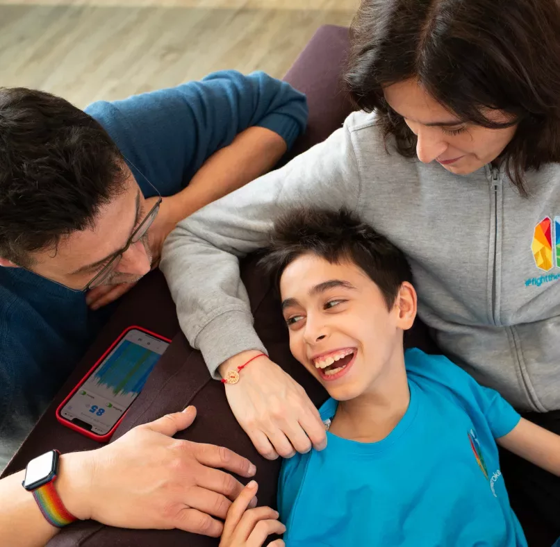 Roberto and his wife Francesca relax with their son Mario. The couple founded FightTheStroke Foundation, a network for parents of children with cerebral palsy to share information and look for solutions.