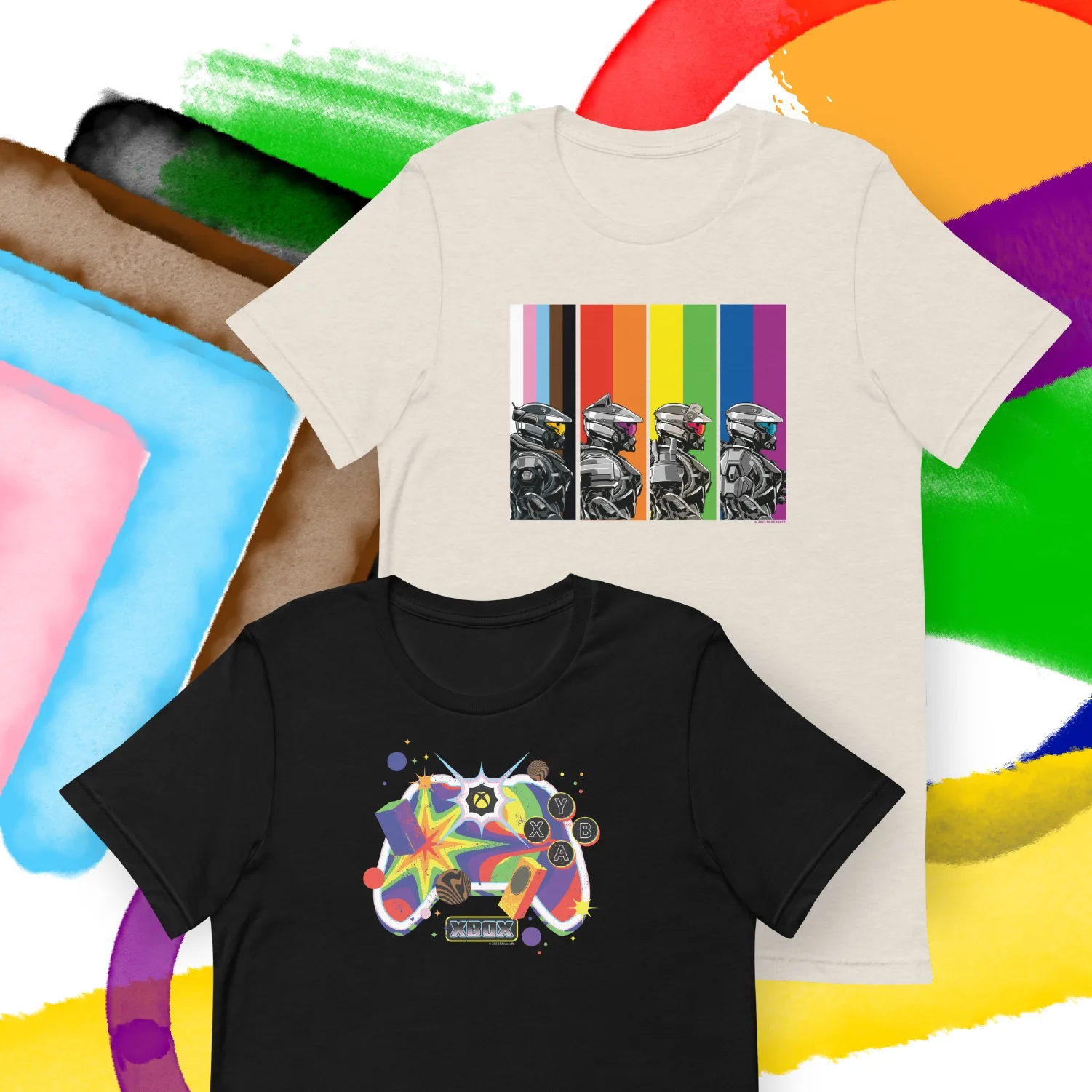 Two t - shirts with colorful designs on them.