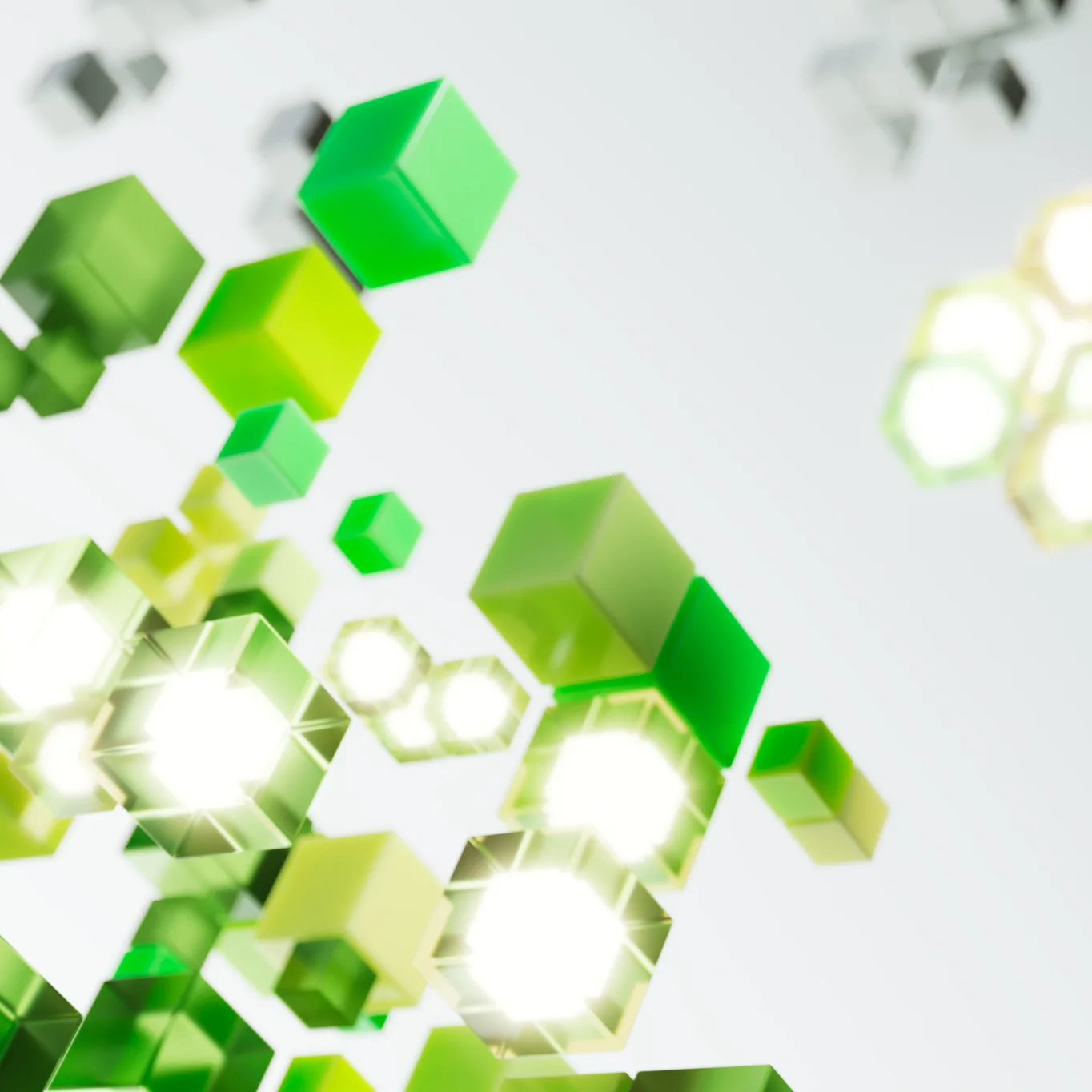 A close-up image of a digitally designed series of cubes that range from colorless to glowing vibrant shades of green. This visual represents how an idea ignites the potential of AI to contribute to human flourishing, magnifying endless possibilities in this rapid revolution.