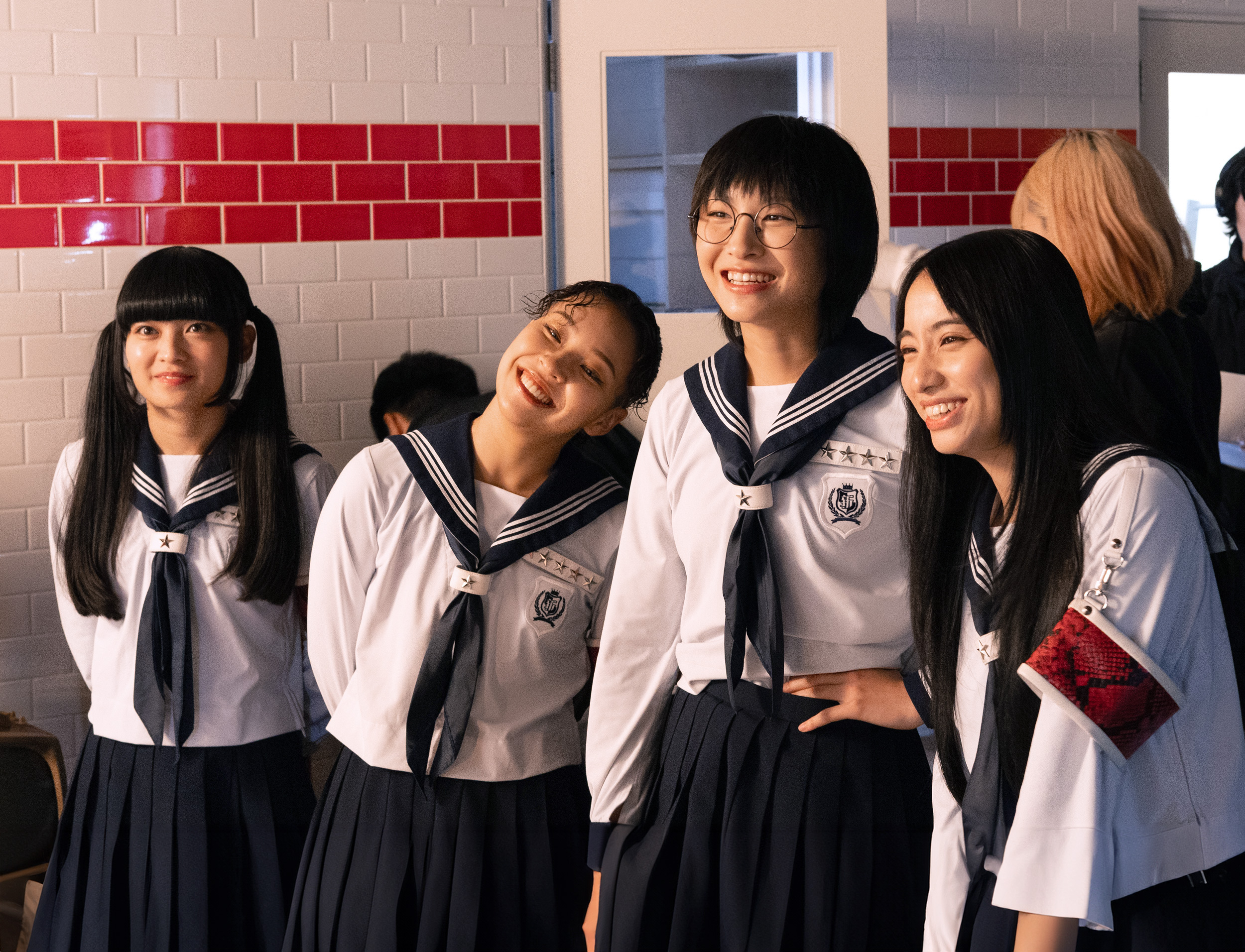 A group of girls in school uniforms