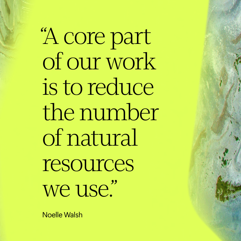 Quote by noelle walsh on a green and blue abstract background stating, "a core part of our work is to reduce the number of natural resources we use.