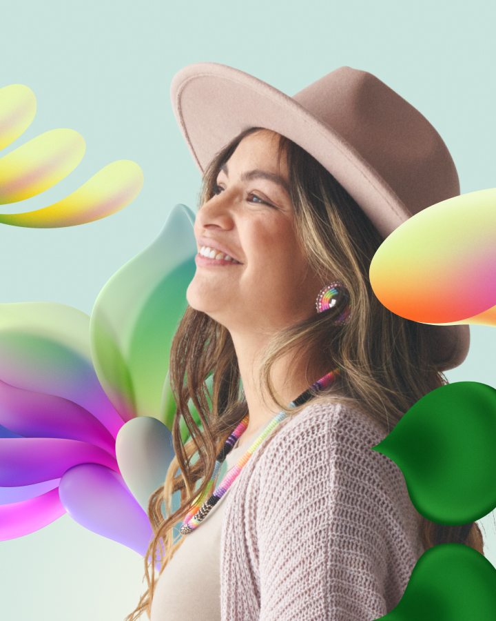 A smiling woman in a pink sweater and tan hat, with colorful abstract shapes in the background.