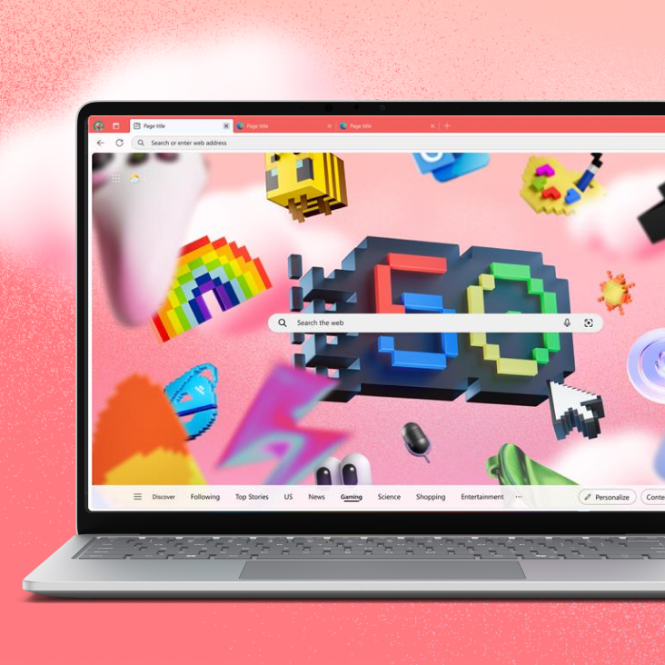 Laptop displaying a colorful, retro-themed browser homepage featuring a search bar, pixelated graphics, and assorted playful icons against a gradient pink background.