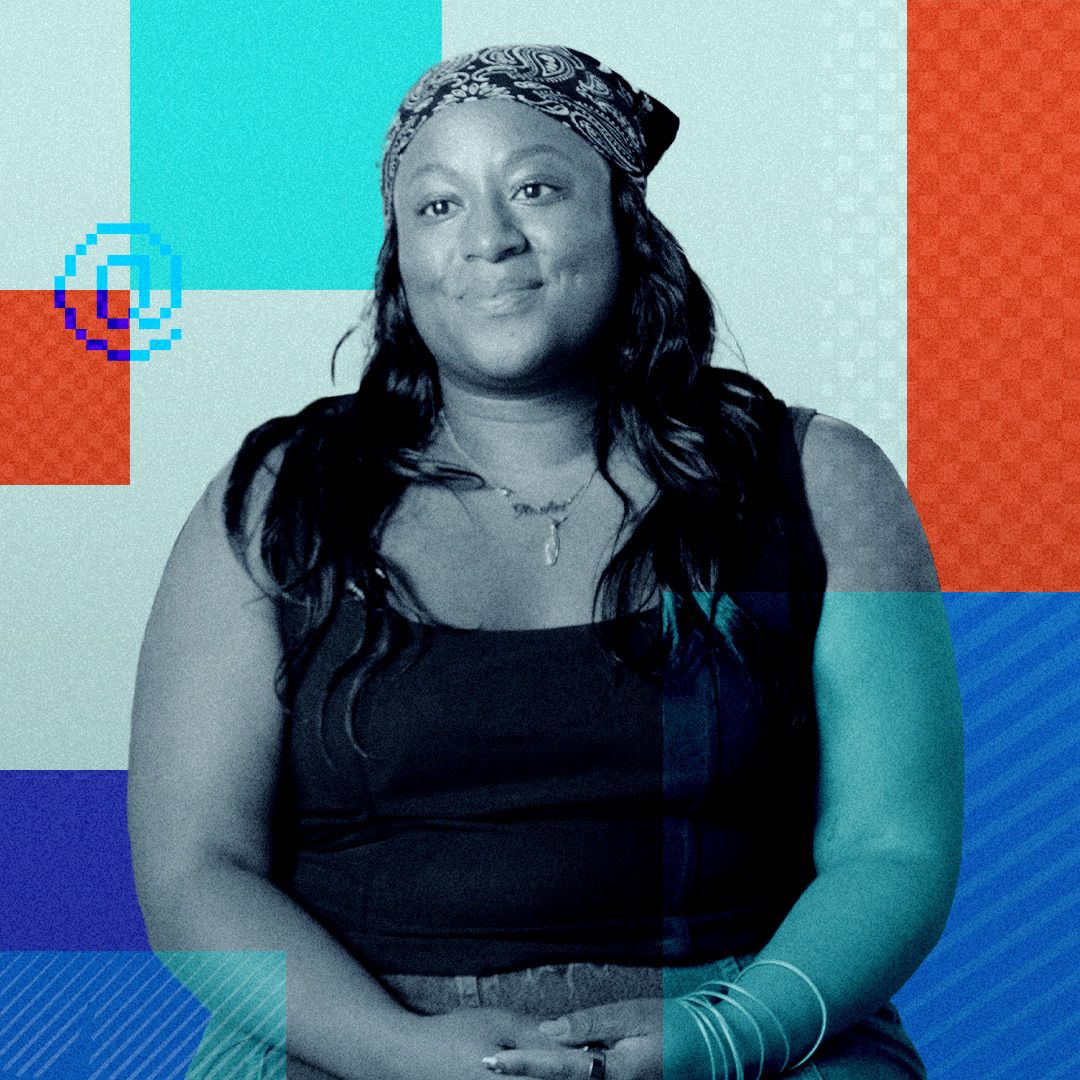 A woman wearing a bandana sits facing forward, with her hands on her lap, against a background of red, blue, and turquoise geometric shapes.