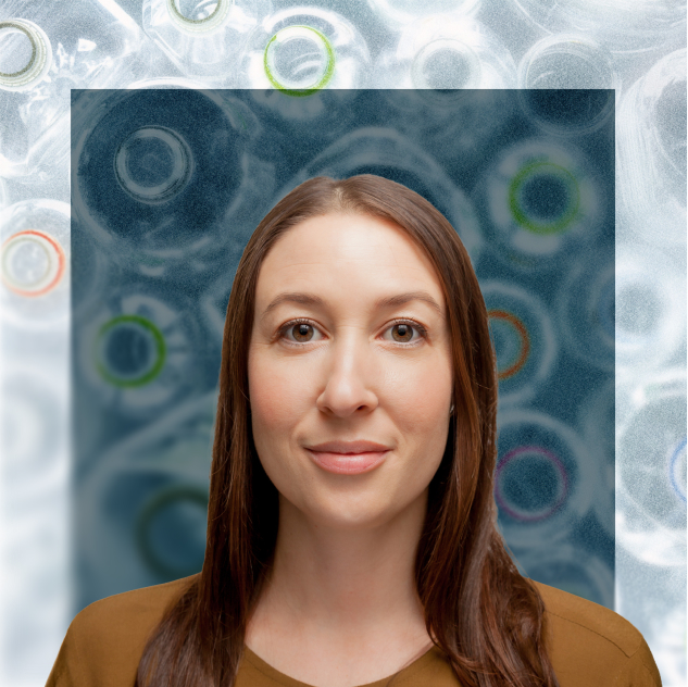 A young woman with long brown hair and a warm smile wearing a mustard-colored top, posed against a blue abstract background featuring circular bubble-like shapes.