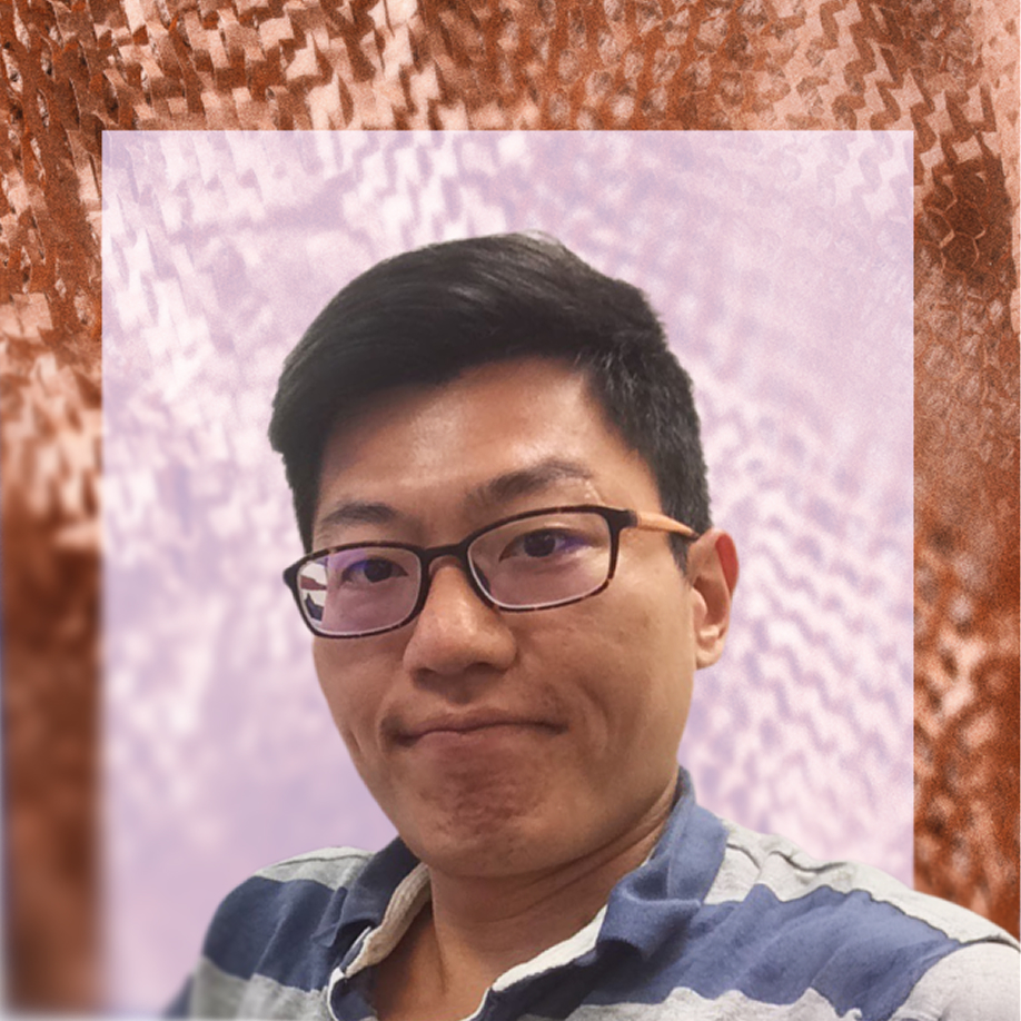 A person with short black hair and glasses wearing a striped shirt poses in front of a lavender and brown textured background.