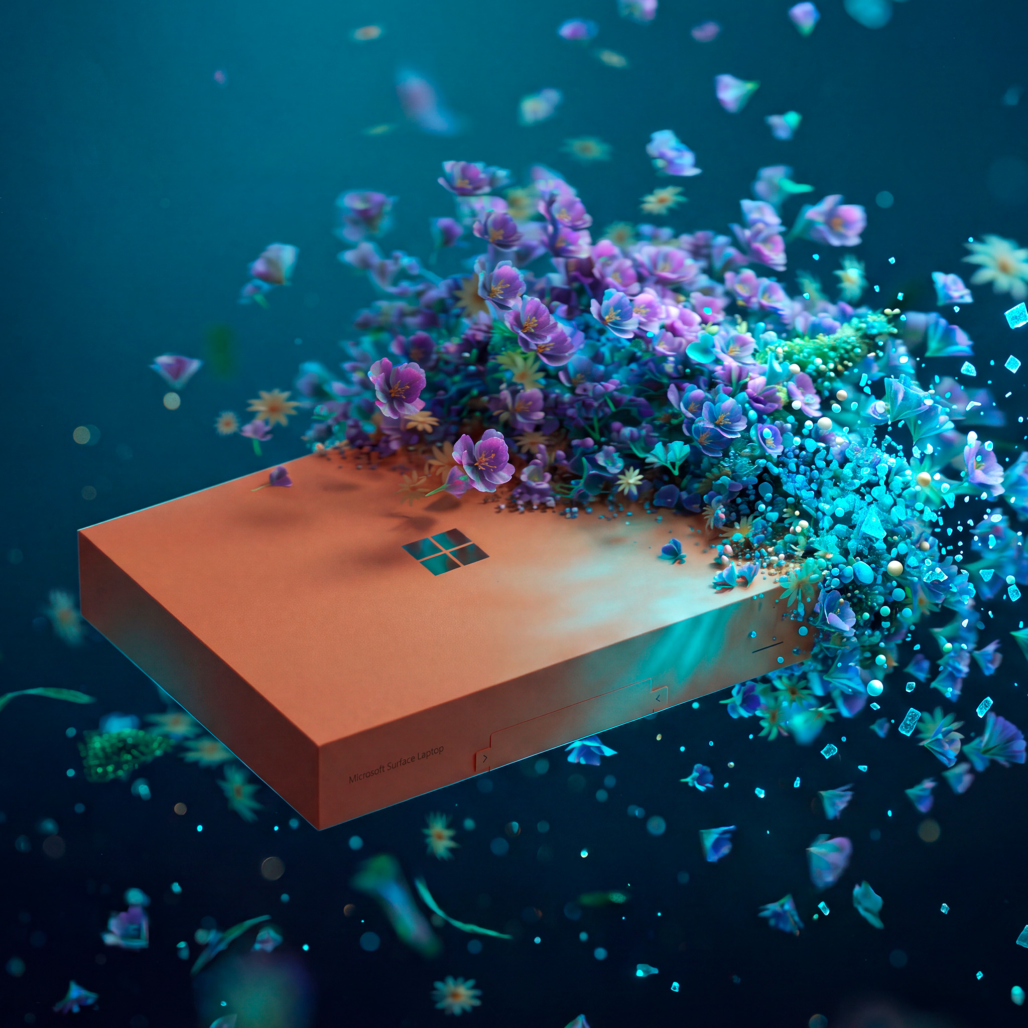 Microsoft Surface Laptop in a coral finish floating against a teal background, surrounded by an explosion of purple and cyan digital flowers and glowing particles