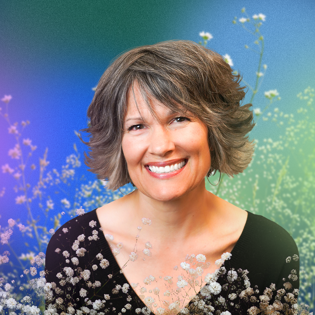 Cindy Arasim smiling warmly, with short gray-brown hair, wearing a black top, surrounded by delicate white wildflowers against a blue and green gradient background
